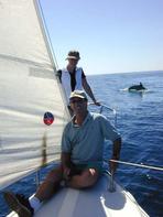1713.tn-sailing_with_dolphins.jpg