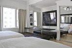 2505.tn-12-entertaining_50_inch_plasma_in_large_bedroom_and_seating_for_up_to_8_people.jpg